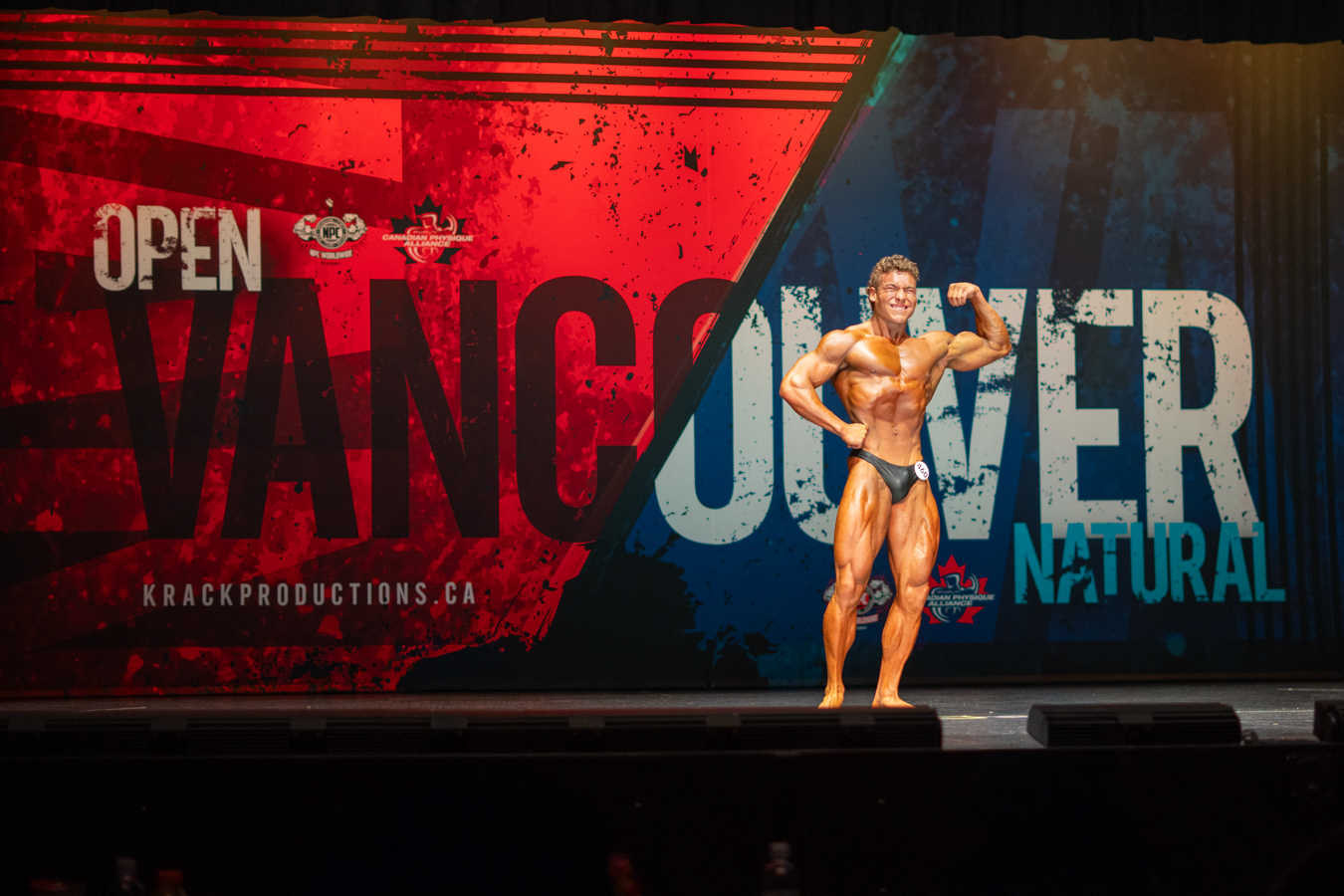 Lorenzo competing on the Vancouver Natural bodybuilding stage